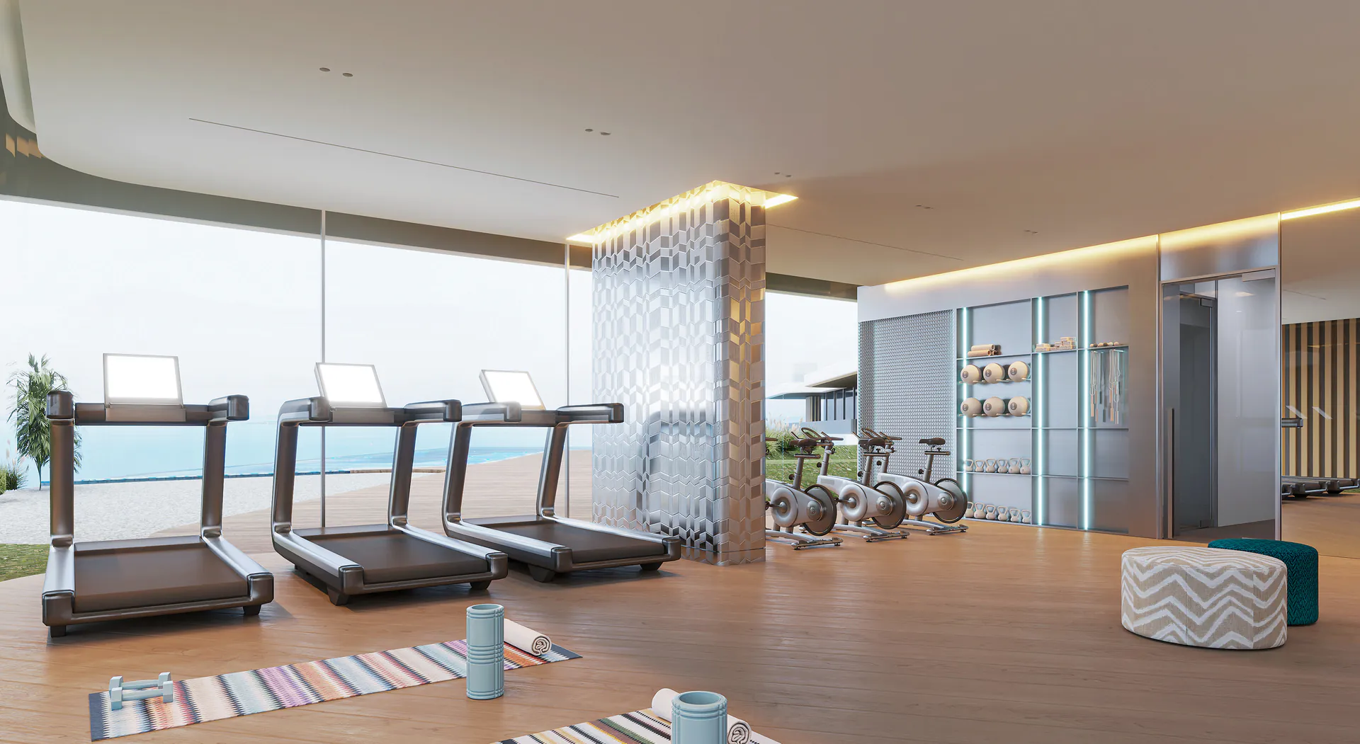 Sea-view gym at The Bay Interiors by Missoni with treadmills facing the Dubai Islands waterfront